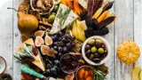 A table featuring an assortment of healthy foods, seen from above loading=